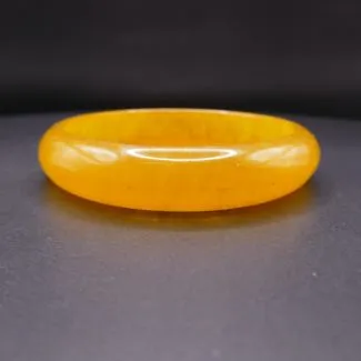 Vintage lukket arm-ring af gult bakelit