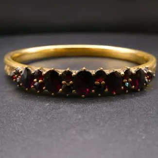 Antik forgyldt armring med meget store, dybt-røde granat-sten