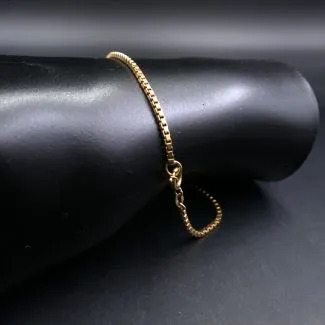 Otte karat guld armbånd/ankelkæde fra Aagaard - på armen