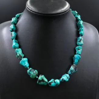 Fenster halskæde med store blålige/brogede turkis 