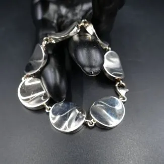 Sølv armbånd af ovale, let hvælvede led