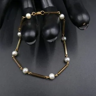 14 karat guld armlænke prydet med ægte perler (19)