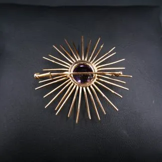 Vintage 14 karat Starburst broche med stor lilla sten