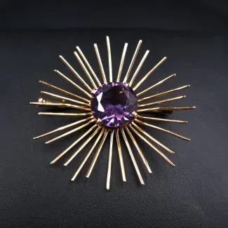 Vintage Starburst broche med stor lilla sten