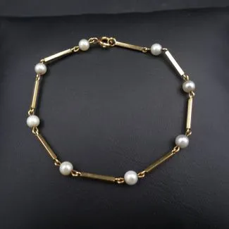 Vintage guld armlænke prydet med ægte perler