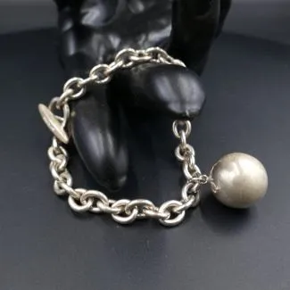 Vintage sølv armlænke med kugle vedhæng fra Siersbøl 