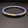 Vintage armring udført i lyseblåt cloisonné med forgyldning