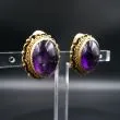 Store øreclips af forgyldt sølv filigran og ametyst fra Fenster - fra siden