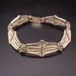 Vintage armlænke i filigran mønster 