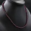 Vintage halskæde med mørkerøde, polerede perler af granater