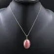 Sølv halskæde med ovalt vedhæng af rhodochrosit