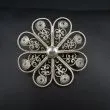 Vintage blomster broche af sølv filigran