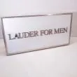 Lysskilt med nyt el "Lauder for men"