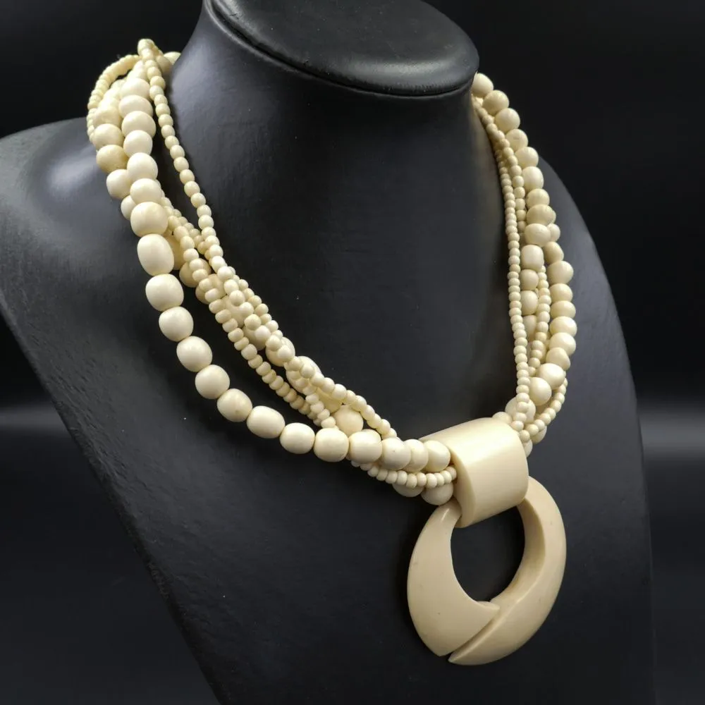 Vintage pragtsmykke af ben med fem rader