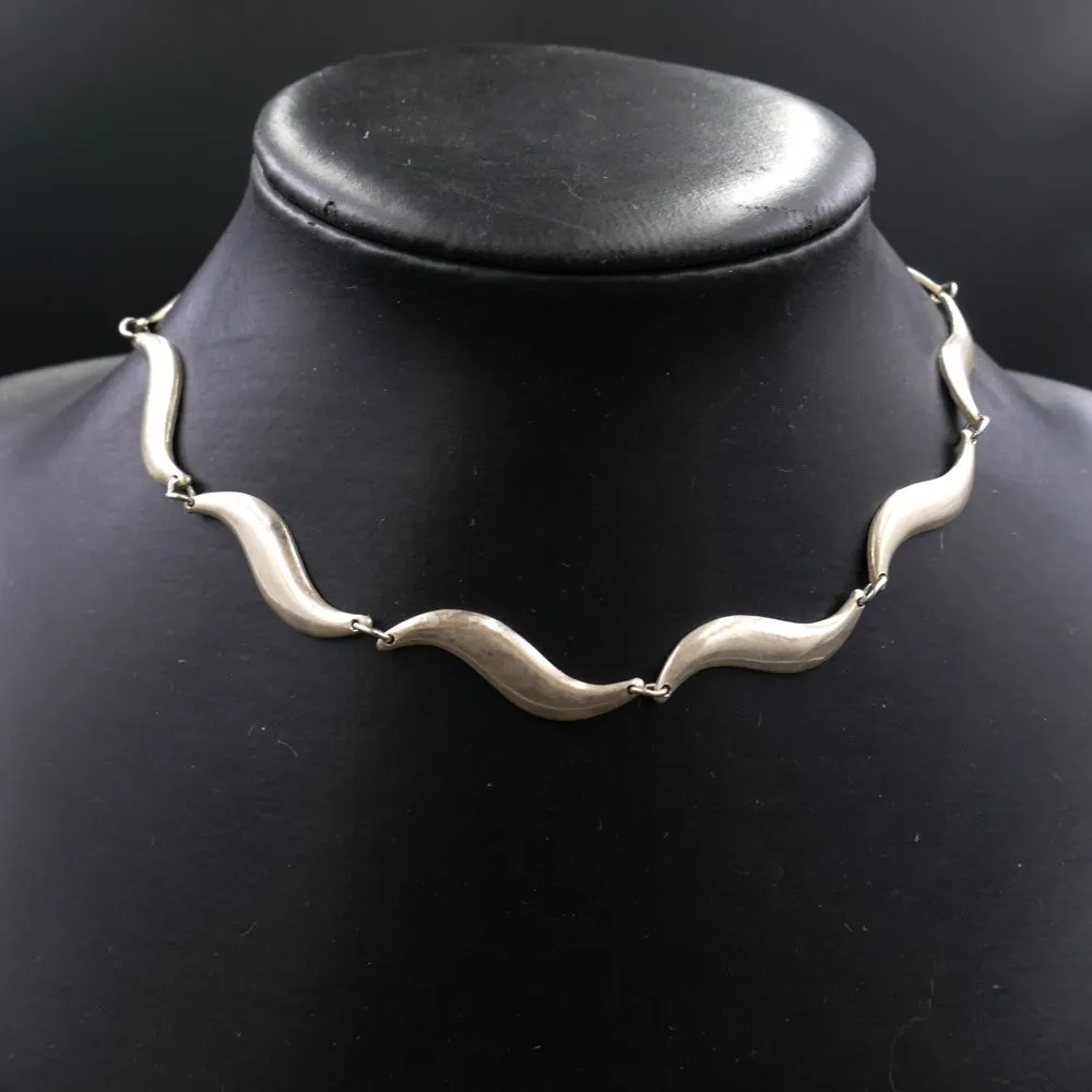 Vintage leddelt halscollier udført i sterling sølv