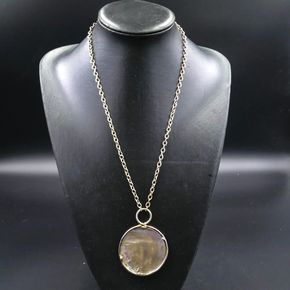 Vintage stort rundt sølvvedhæng med indlagt perlemors-skal