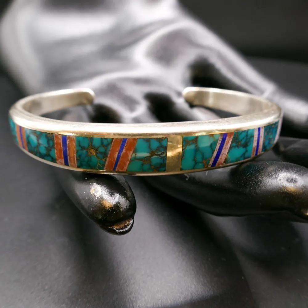 Kraftig vintage armring af sølv med indlagte halvædelsten