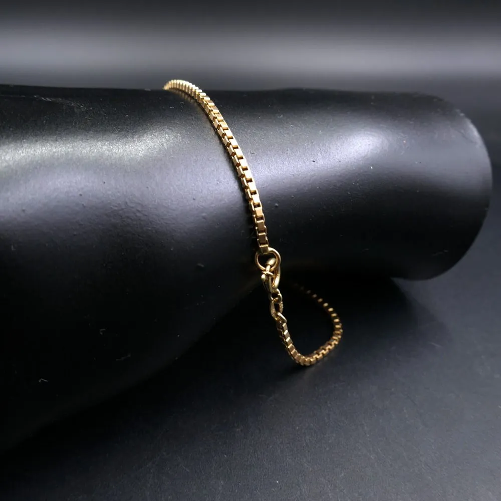 Otte karat guld armbånd/ankelkæde fra Aagaard - på armen