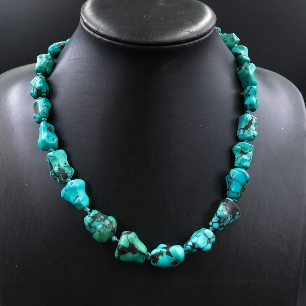 Fenster halskæde med store blålige/brogede turkis 