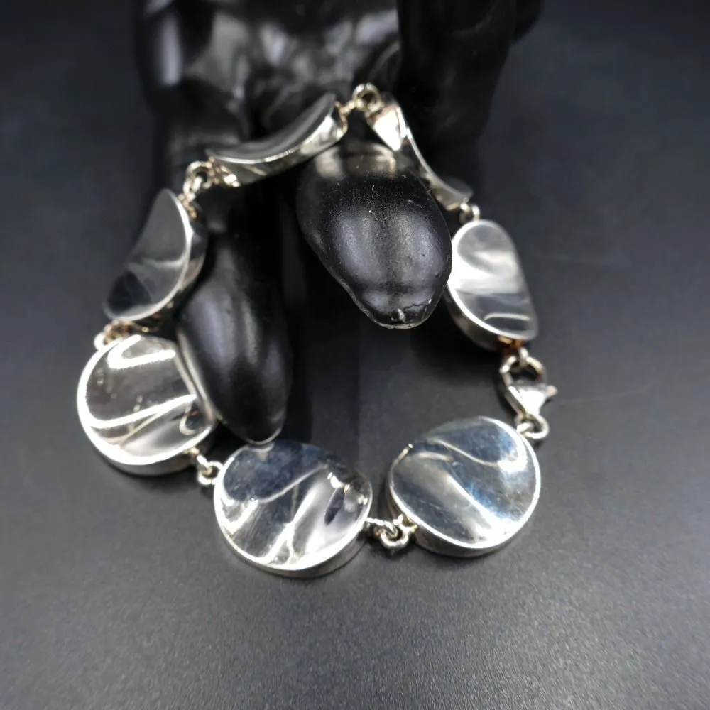 Sølv armbånd af ovale, let hvælvede led