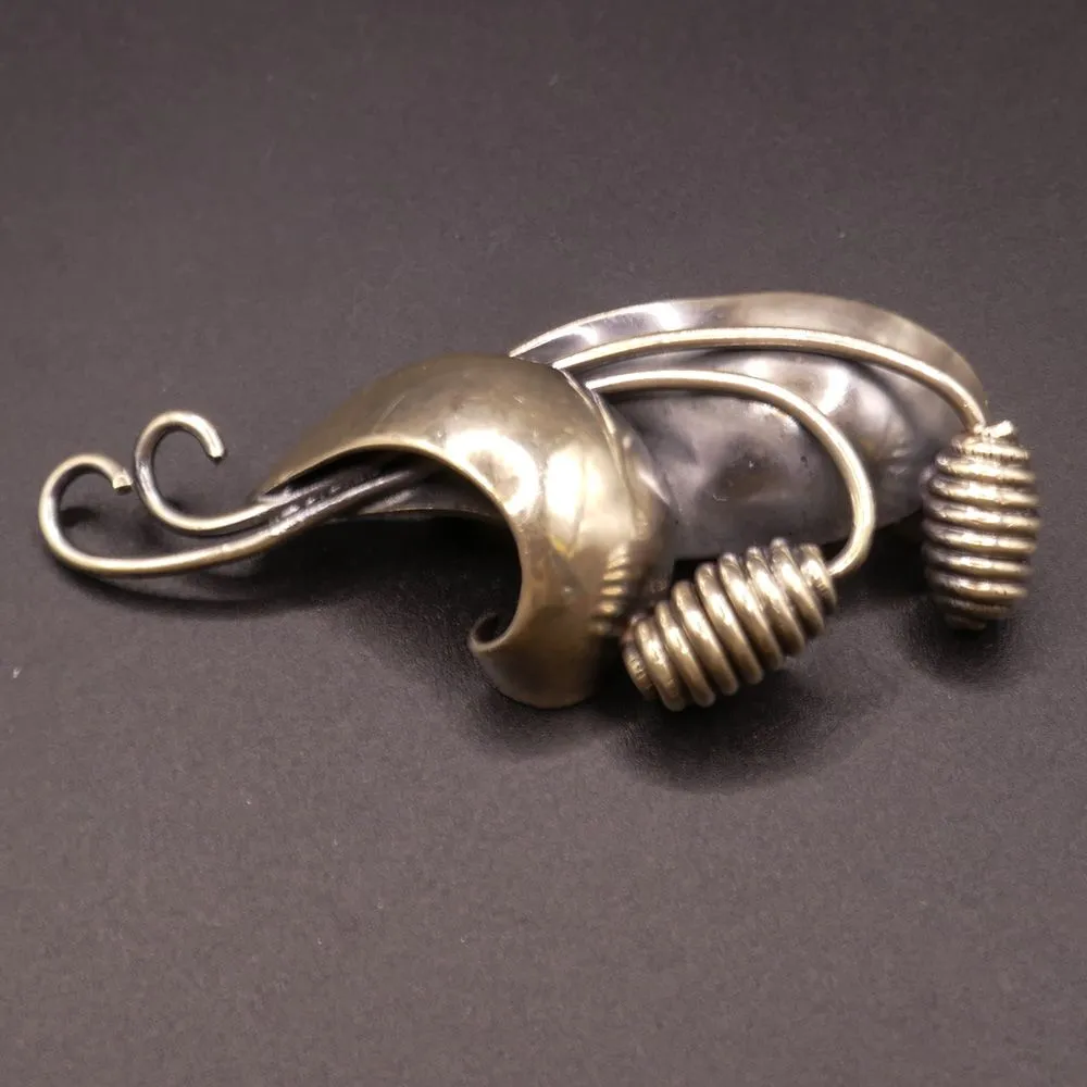 Vintage kraftig buket broche udført i sølv delvist oxyderet