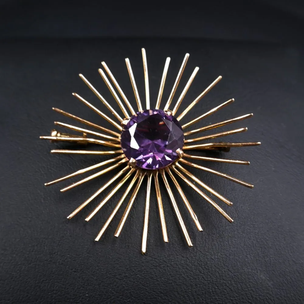 Vintage Starburst broche med stor lilla sten
