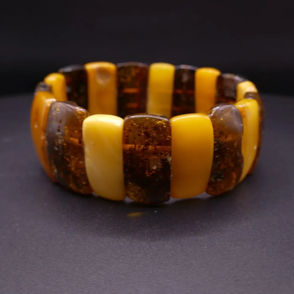 Bredt vintage armbånd med to nuancer af rav